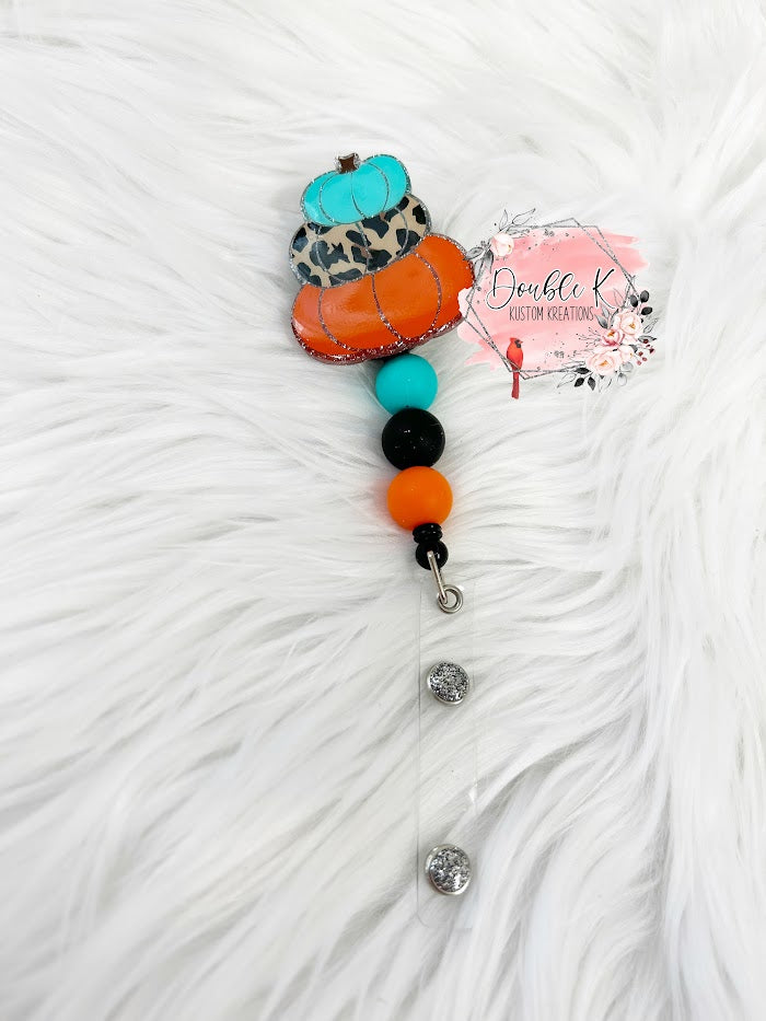 Stacked Pumpkin Badge Reel